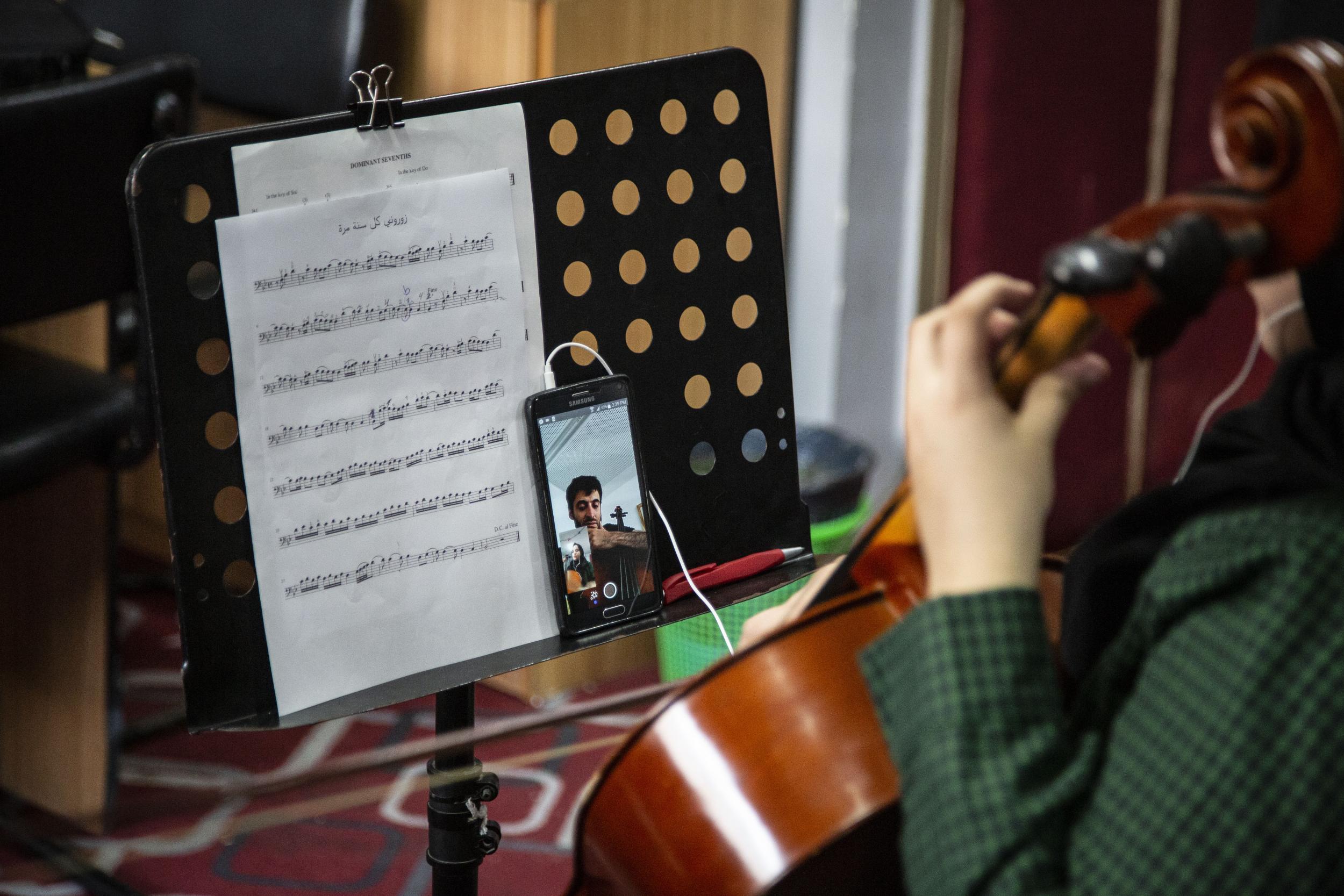 A Palestinian musical student takes lessons on Skype in Gaza