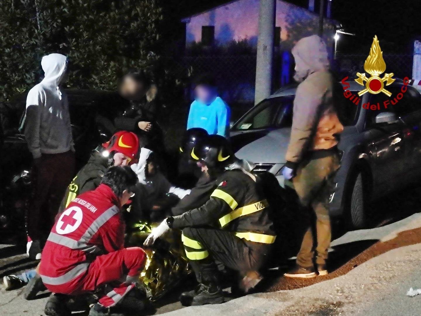 Italian fire and rescue service treating victims after a stampede at a nightclub in Cornaldo