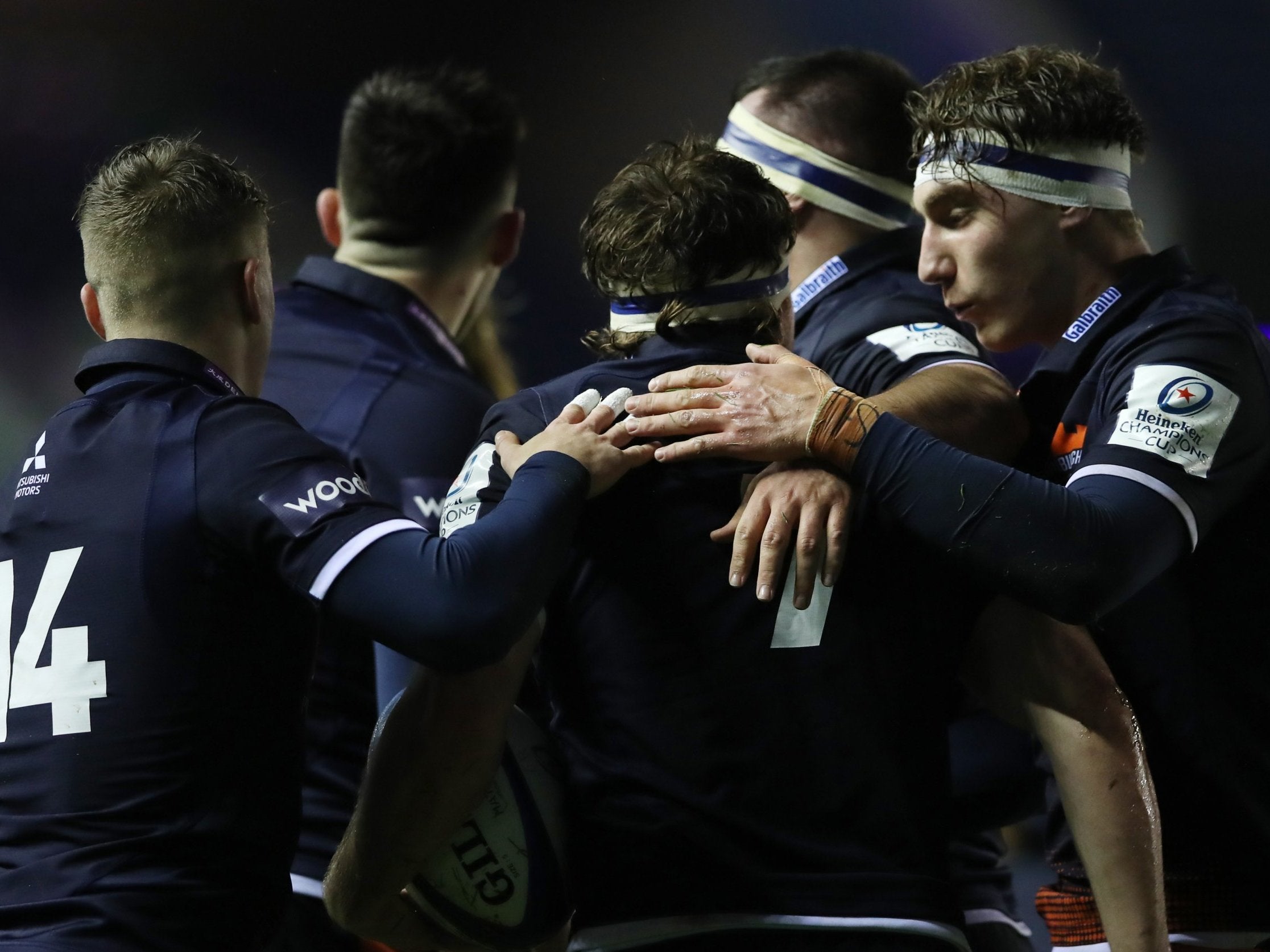 Hamish Watson celebrates with his Edinburgh teammates after scoring a try