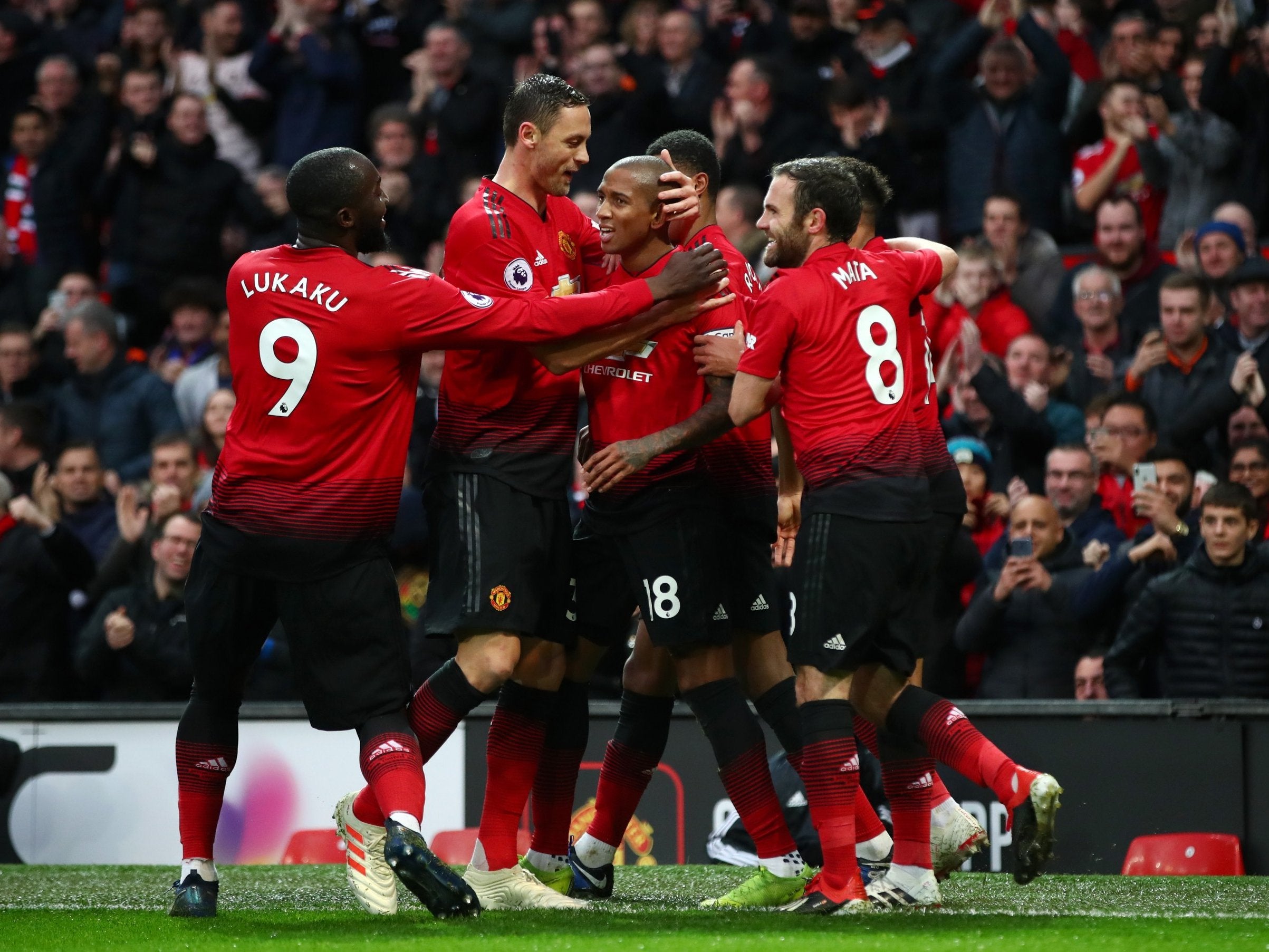 United players congratulate Ashley Young after his early goal