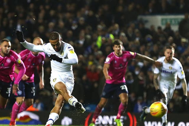 Kemar Roofe scores Leeds United's second goal in the victory over QPR