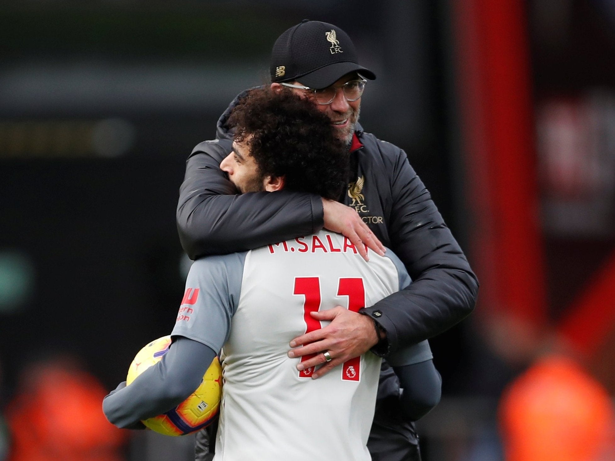 Jurgen Klopp congratulates Mohamed Salah after his hat-trick