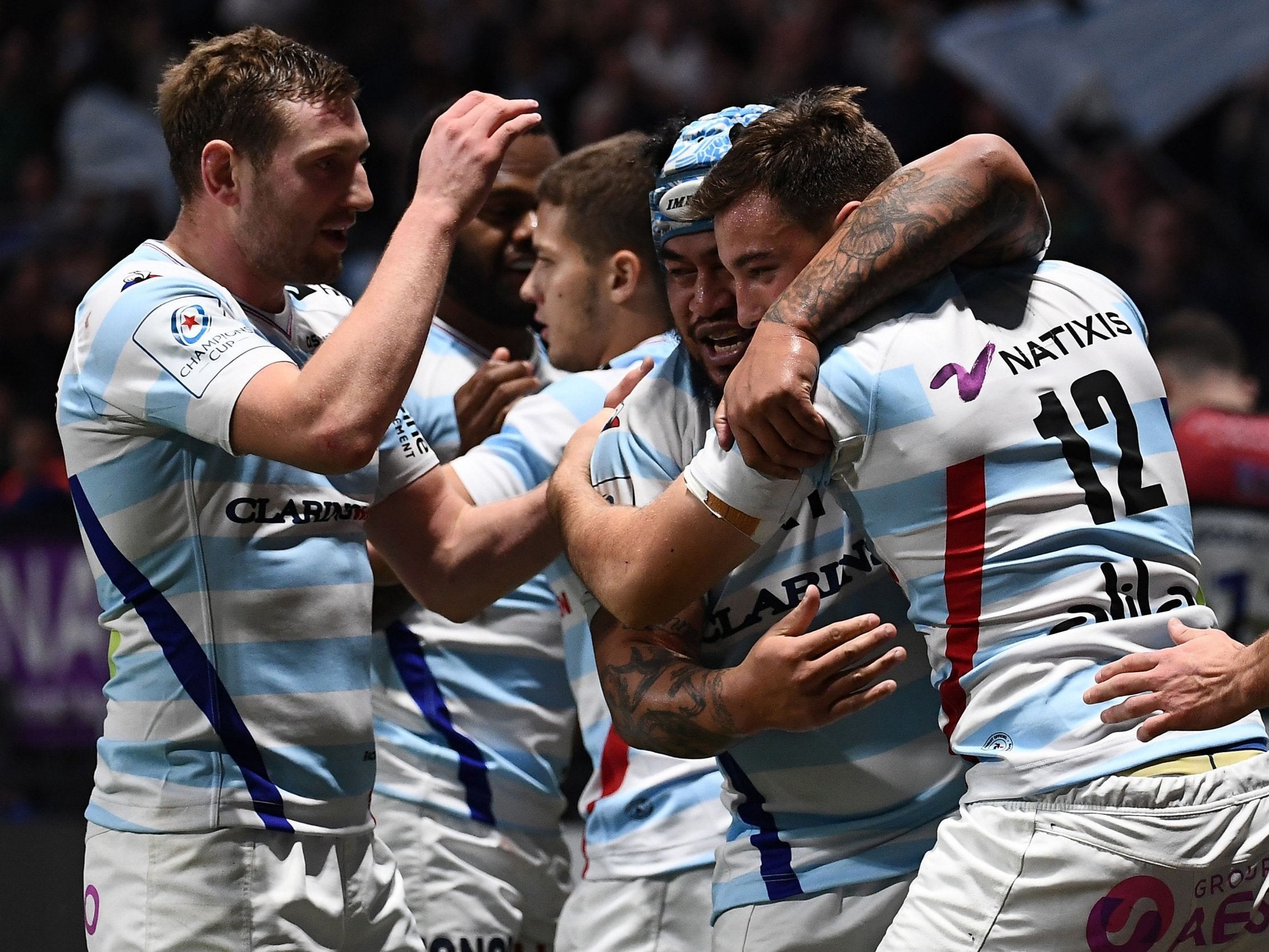 Racing's Olivier Klemenczak, right, celebrates his try with team-mates