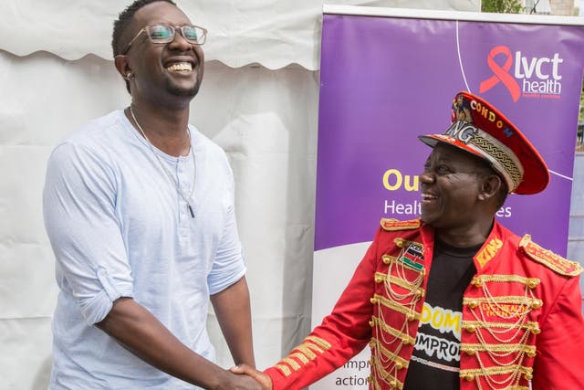 Kenyan pop star Tetu Shani, left, with ‘King of Condoms’, Stanley Ngara