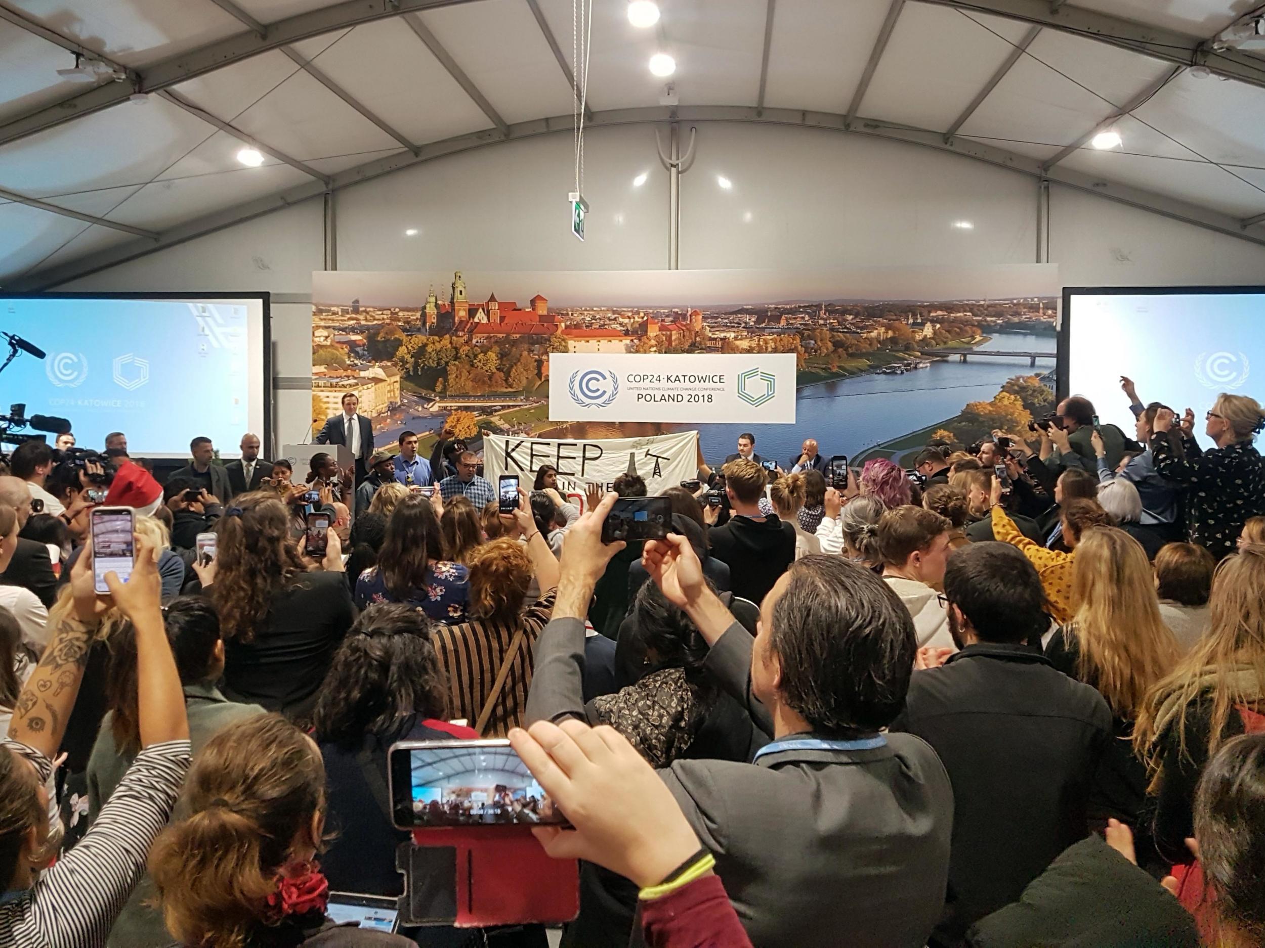 Youth and indigenous groups protest against fossil fuels during US-hosted event at the UN climate talks in Katowice