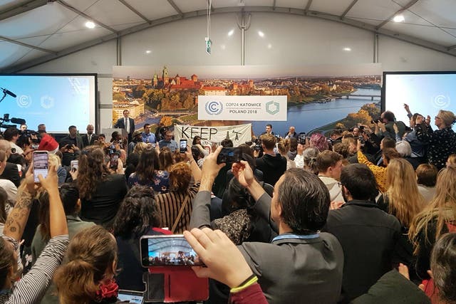Youth and indigenous groups protest against fossil fuels during US-hosted event at the UN climate talks in Katowice