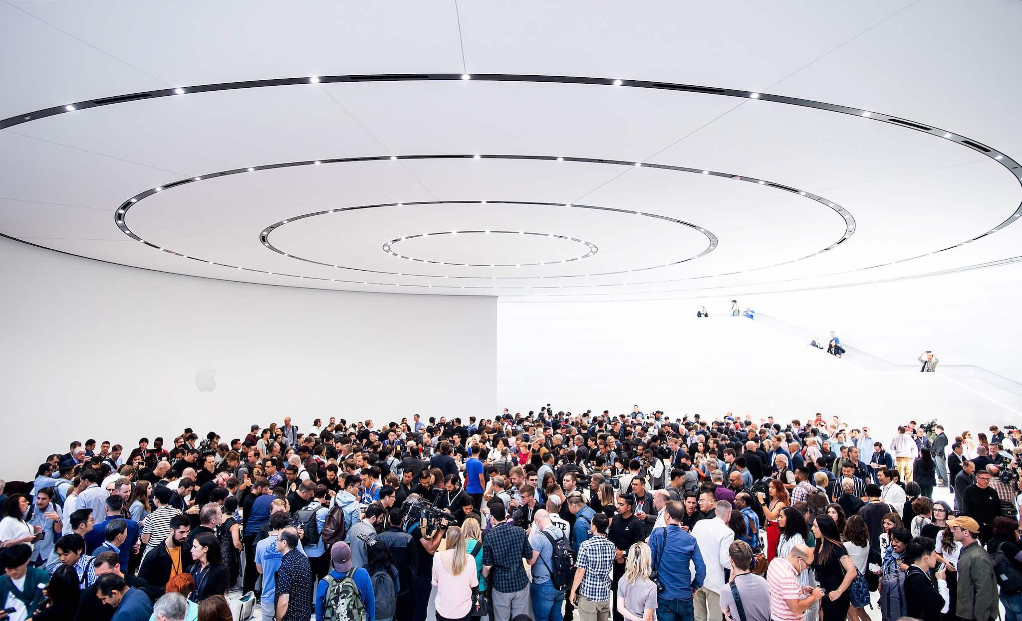 In this file photo taken on September 12, 2018 attendees gather for a product launch event at Apple's Steve Jobs Theater in Cupertino, California