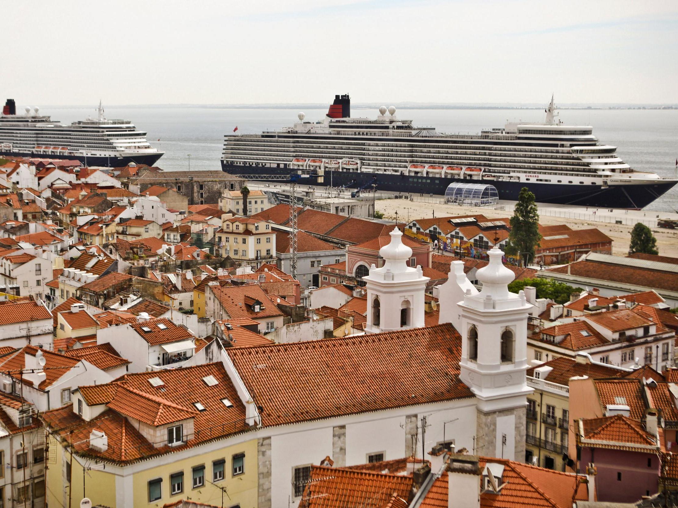 Cruise ships lie at anchor at the terminal in Lisbon in Portugal