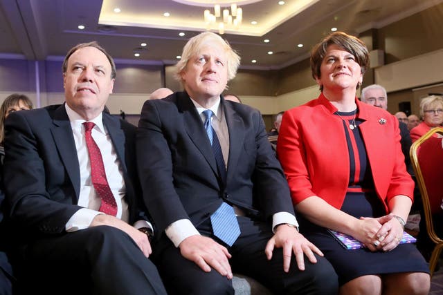 Boris Johnson, pictured with DUP leader Arlene Foster and Nigel Dodds MP at the party's conference in Belfast, November 2018