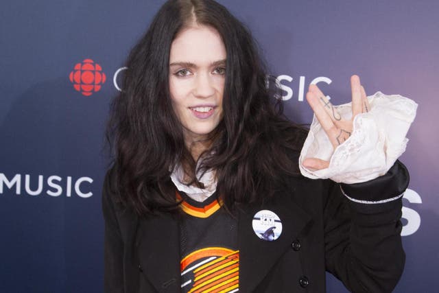 Grimes attends the red carpet arrival at the 2018 Juno Awards at Rogers Arena on 25 March, 2018 in Vancouver, Canada.