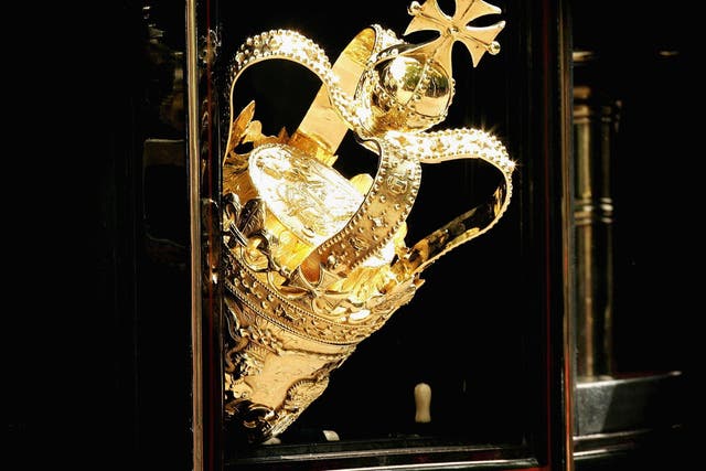 The ceremonial mace protruding from a carriage window as it travels to Parliament