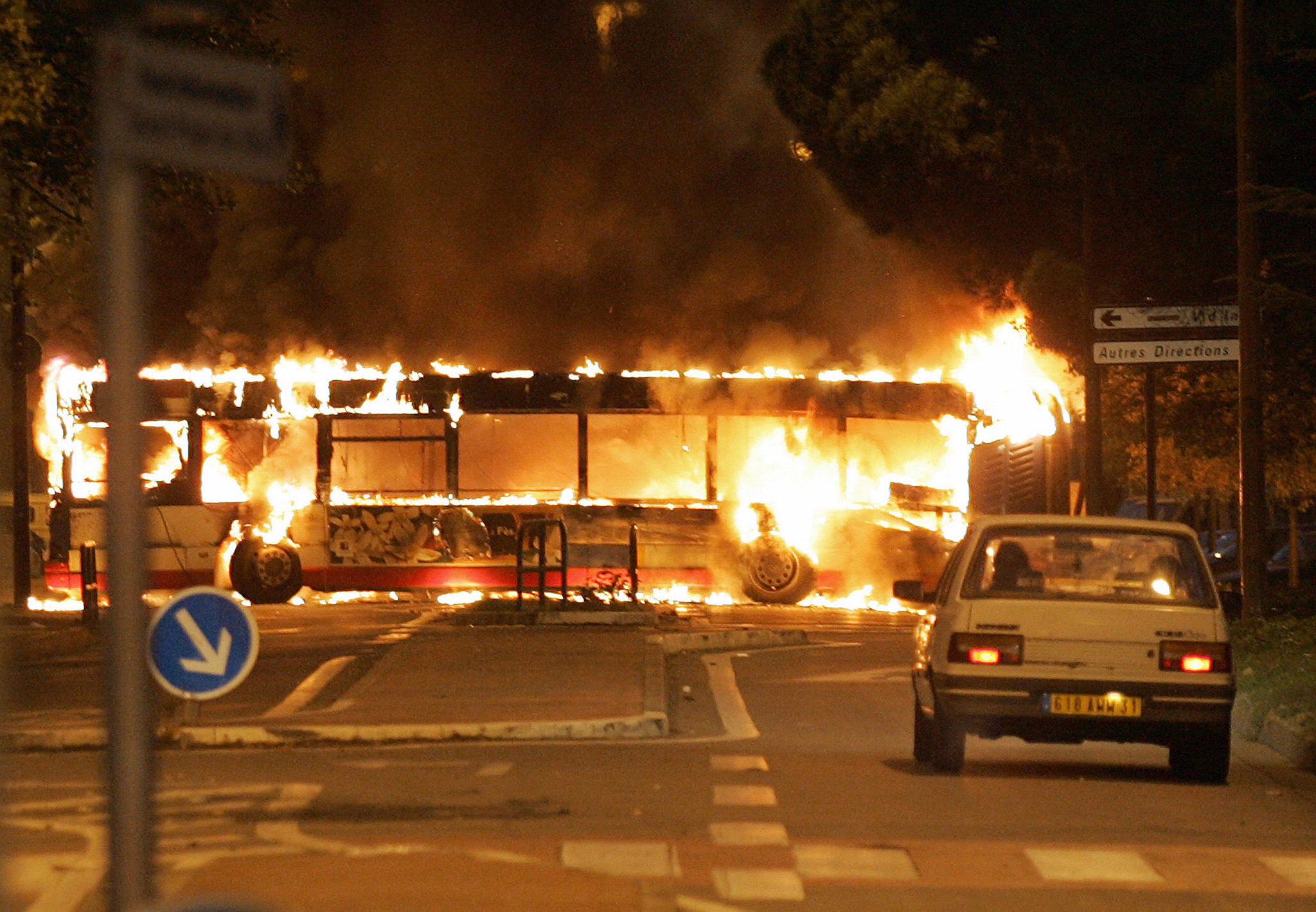 A bus burns in Toulouse in 2005 after protests spread across the country
