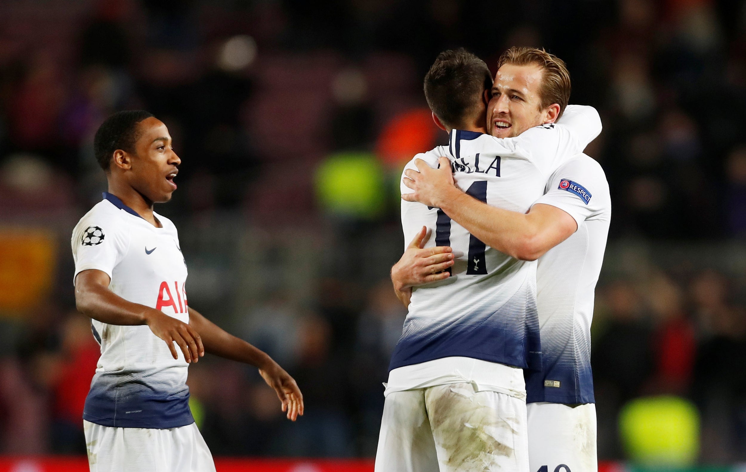 Walker-Peters celebrates with Lucas Moura and Harry Kane after the equaliser