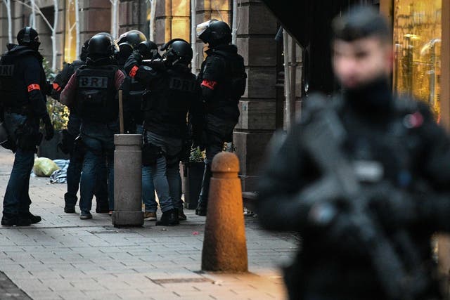 Members of the French special forces conduct searches for the gunman