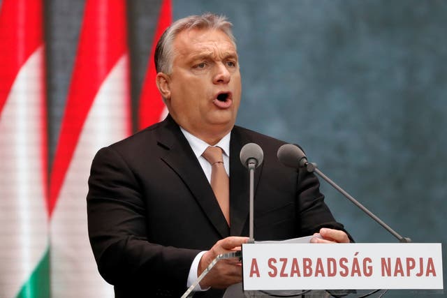 Hungarian Prime Minister Viktor Orban delivers a speech in front of the House of Terror during the celebrations of the 62nd anniversary of the Hungarian Uprising of 1956