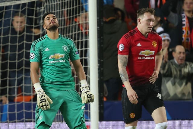 Phil Jones reacts after putting the ball past his own goalkeeper Sergio Ramos