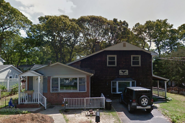 The house on Long Island where George Carroll's remain were found buried under the basement