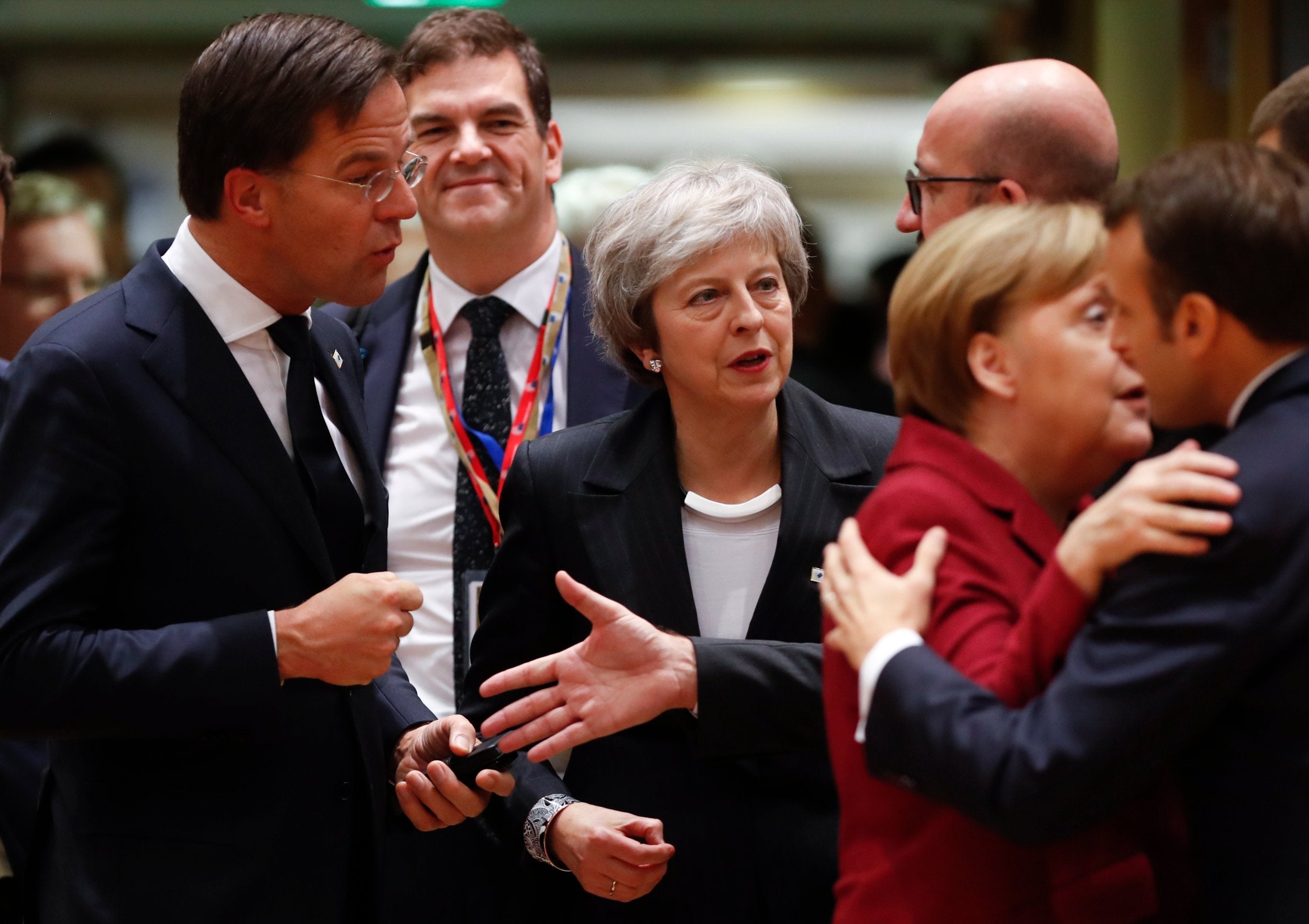 Theresa May arrives at the meeting in Brussels