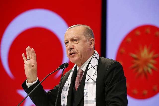 Turkey's President Recep Tayyip Erdogan speaks in Istanbul on Friday, 14 December 2018.