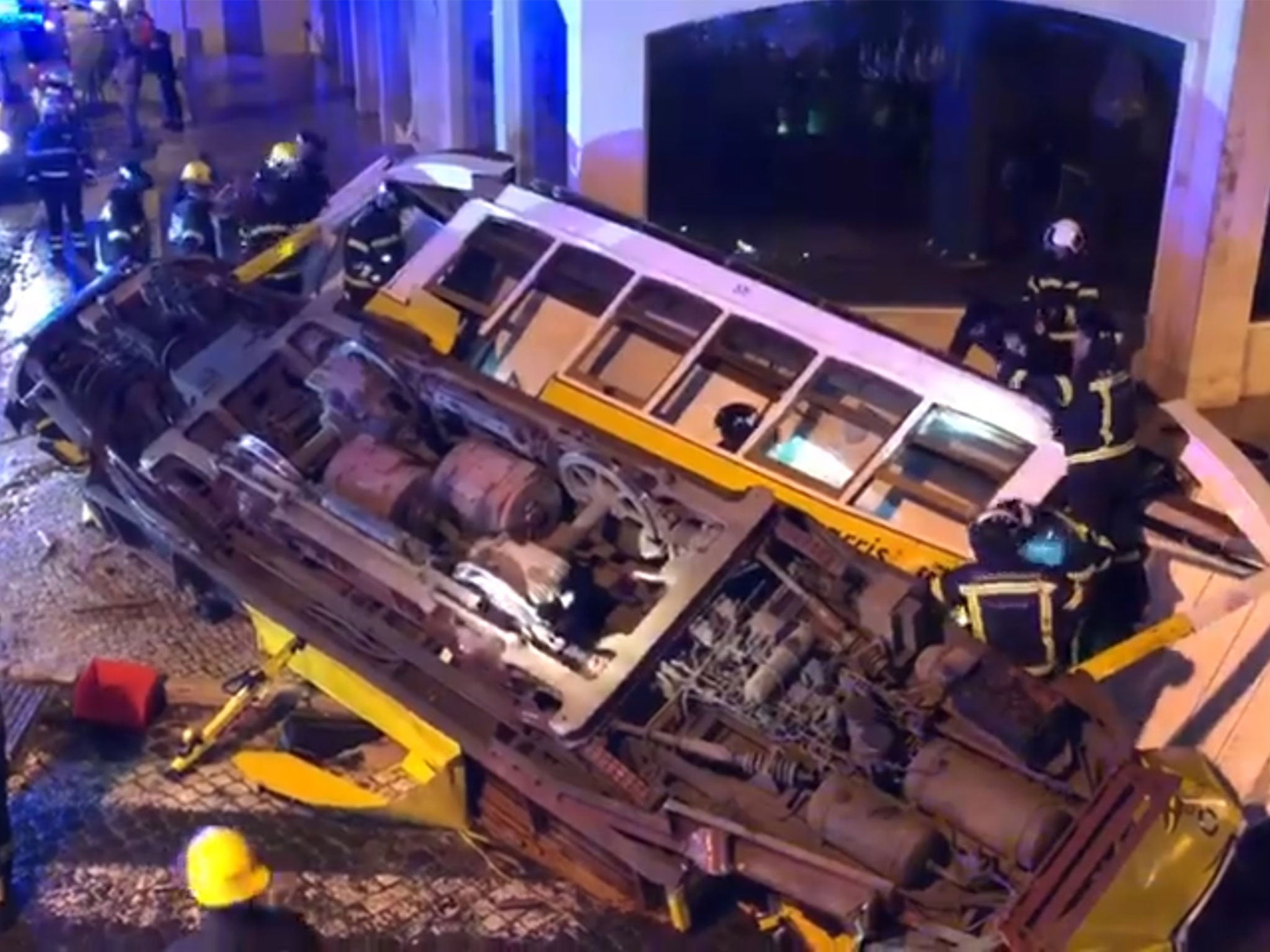 Witnesses saw people a baby and child to safety from the wreckage of the tram