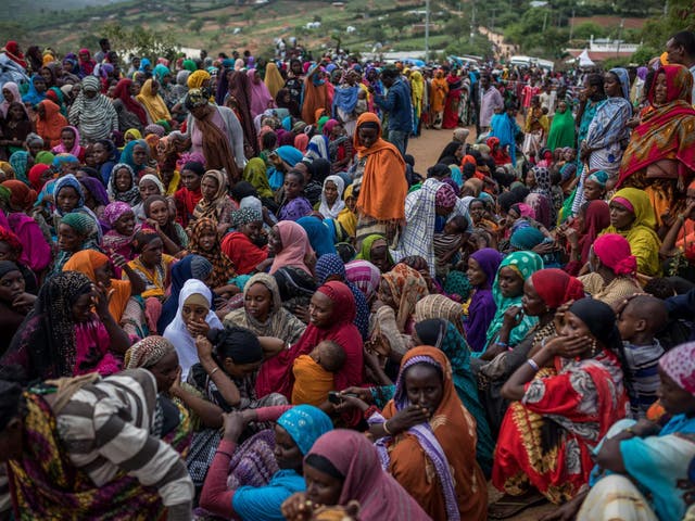 Hundreds of Ethiopians have crossed the border to Kenya. Pictured: women waiting for supplies distributed by Kenyan Red Cross at border town Moyale earlier this year