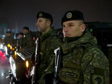 Serbia threatens military action after Kosovo votes to create army