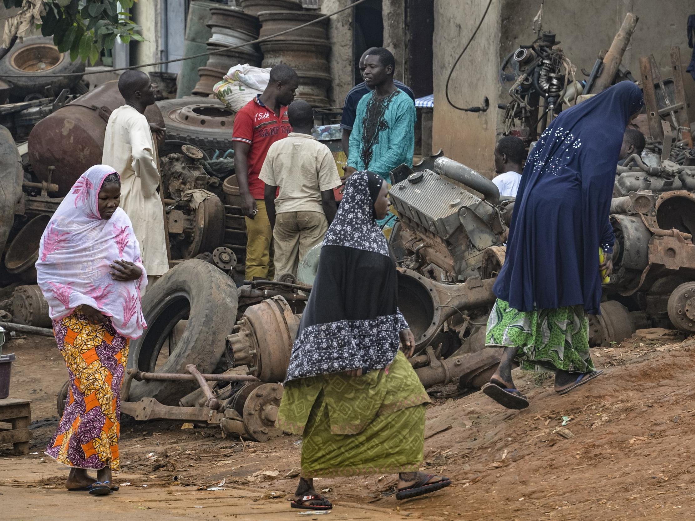 Muslim women walk in the Brituetterie district of Yaounde on 16 July 2015. This northern region of Cameroon has suffered frequent attacks. (Reinnier KAZE /