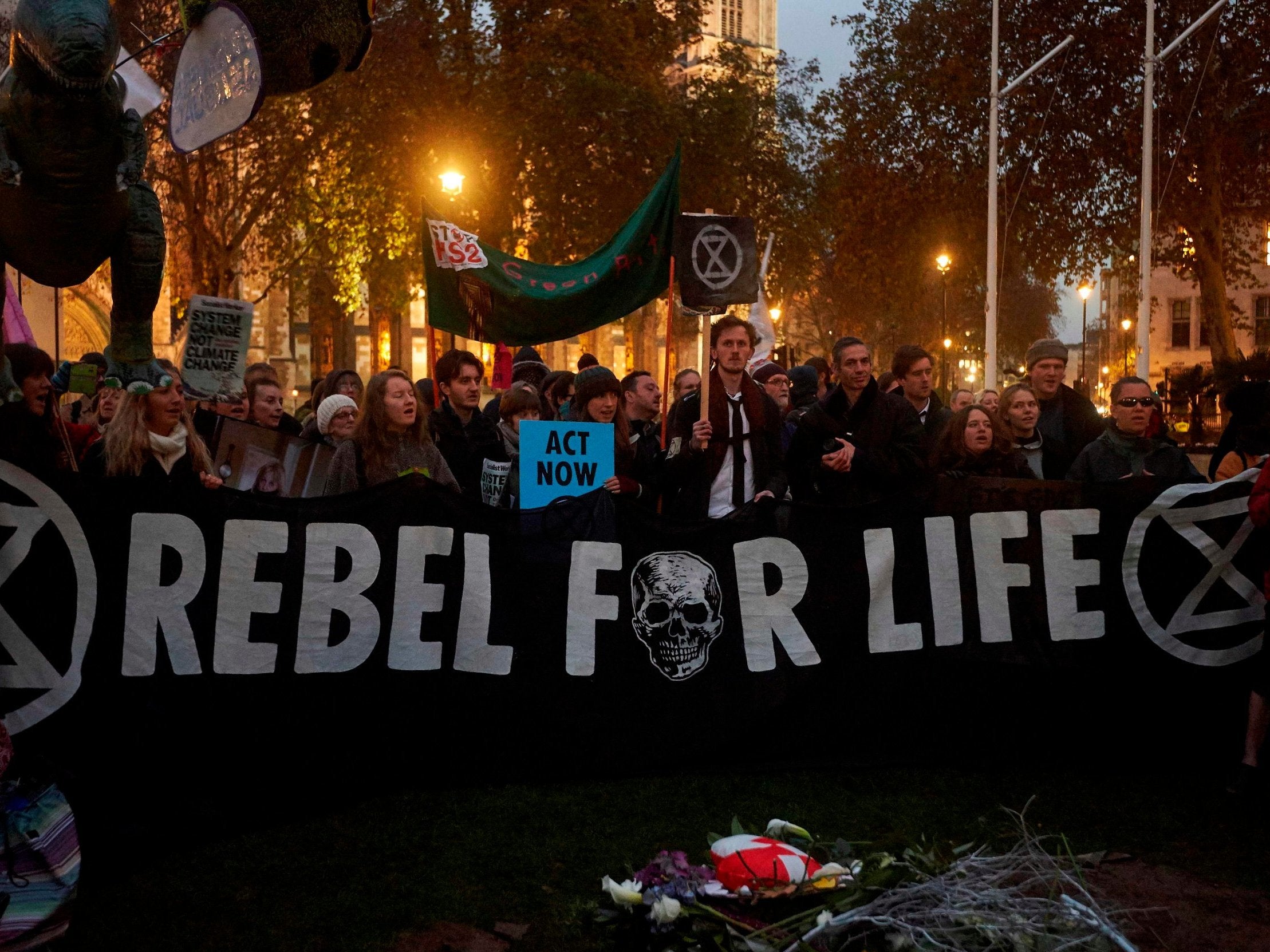 Environmental activists from the Extinction Rebellion movement gather in Parliament Square in central London on 24 November, 2018