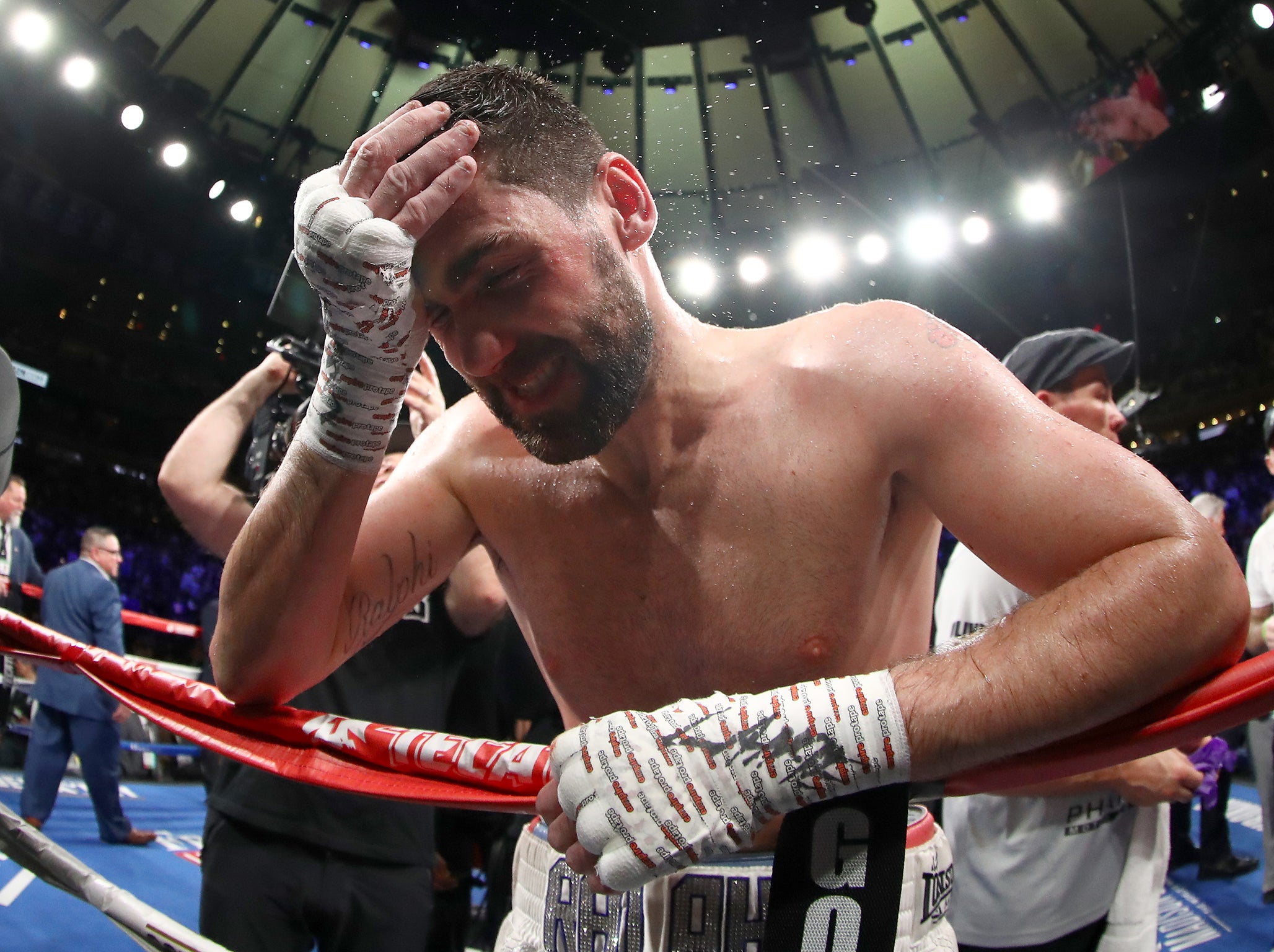 Rocky Fielding sinks to the ropes after defeat