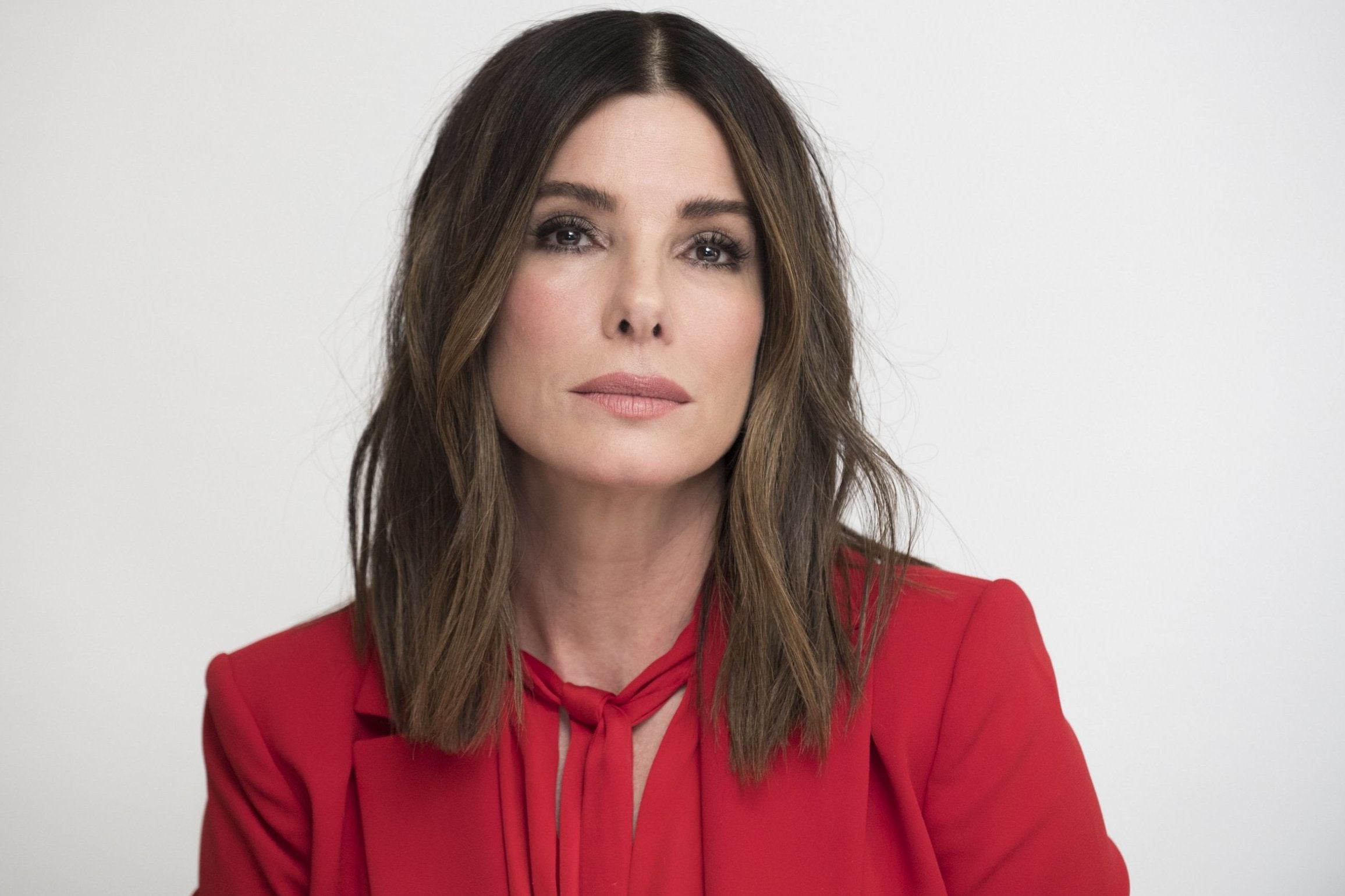 How old is Sandra Bullock?