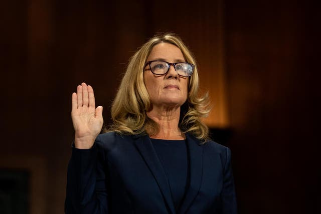 Christine Blasey Ford is sworn in prior to giving testimony before the U.S. Senate Judiciary Committee in September 2018