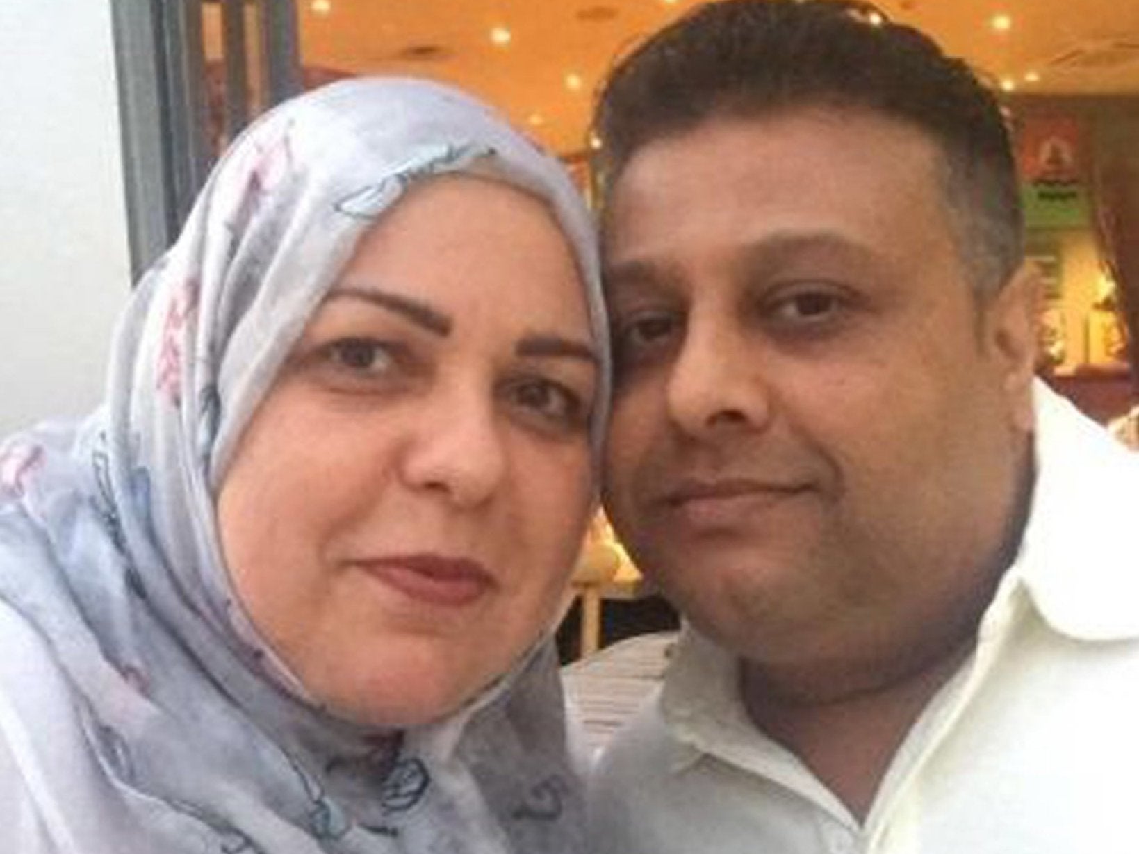 Khaola Saleem with her husband Mohamed. Janbaz Tarin has admitted murdering Mrs Saleem and her daughter Raneem Oudeh in a frenzied knife attack