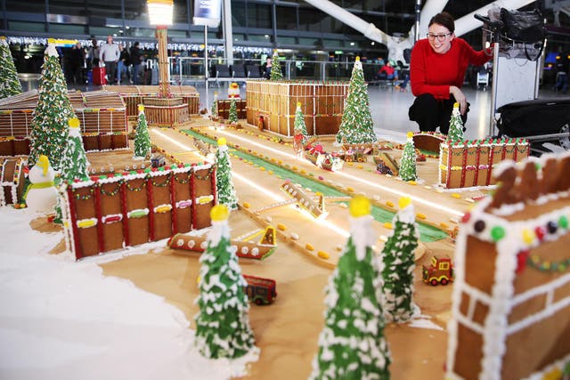 Great British Bake Off 2016 winner, Candice Brown and food artist Michele Wibowo unveiled a 50kg gingerbread model of Heathrow