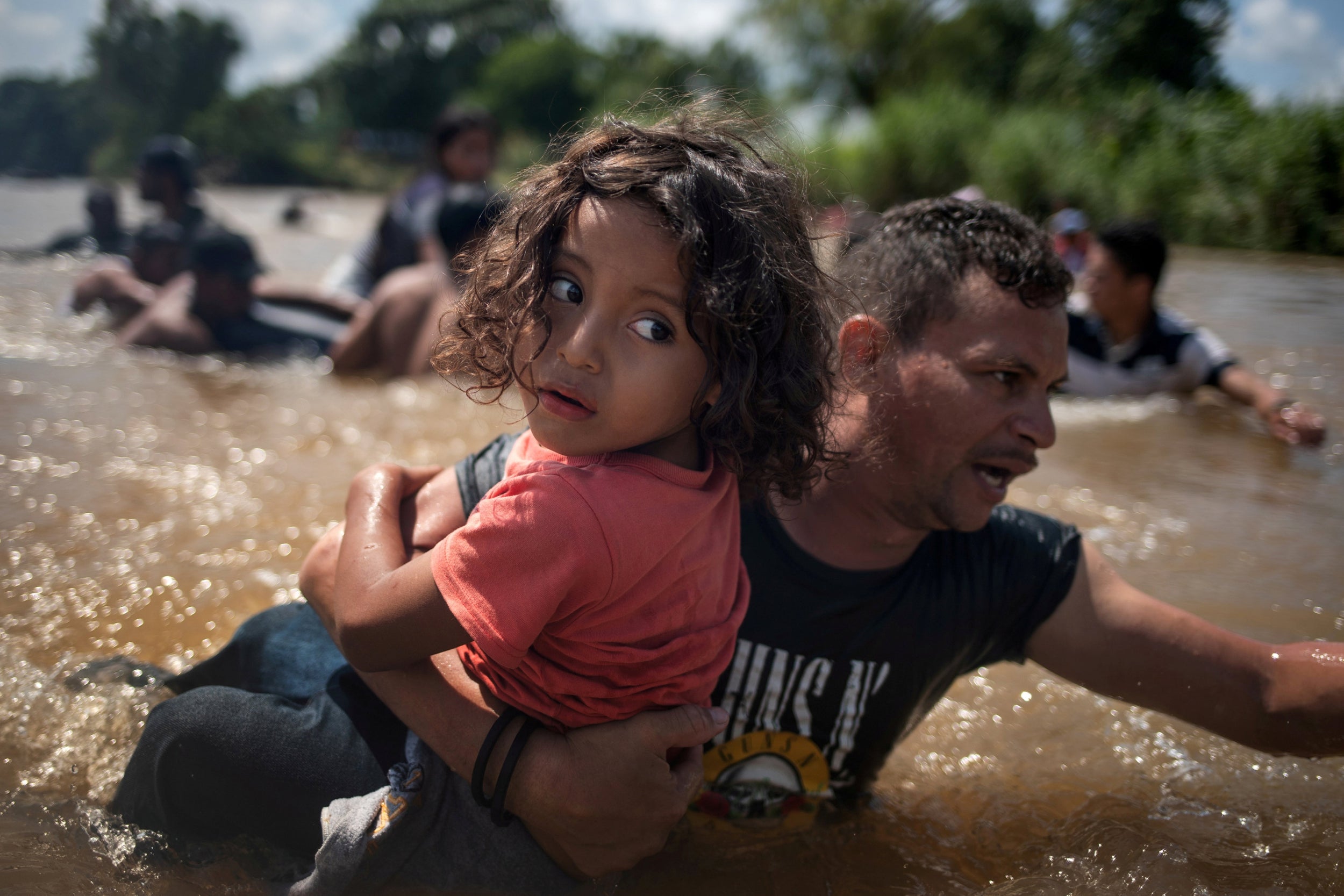 Migrants make the arduous journey towards the United States as thousands travel in caravans from countries across Latin America.