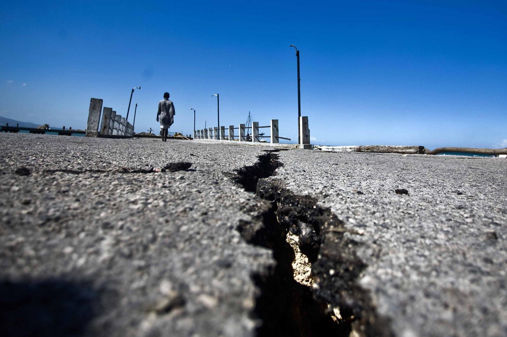 Cracks in the street after an earthquake in Haiti in 2010