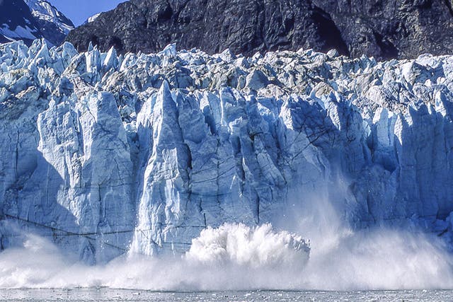 Vanishing act: ice blocks crash into the sea on the Alaskan coast