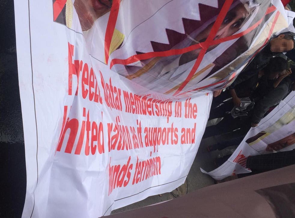 Anti-Qatar banners paraded at fake demonstration outside UN in New York