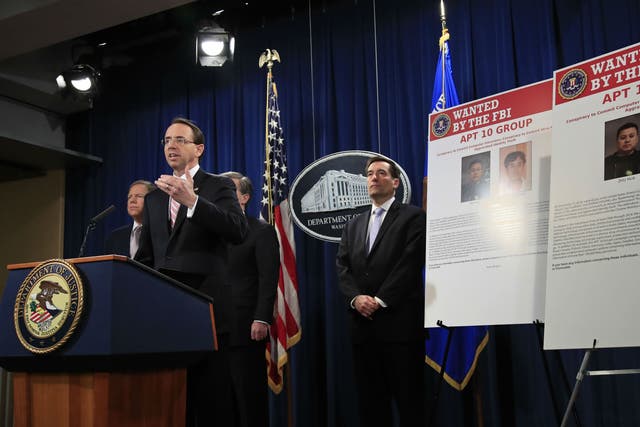 Deputy Attorney General Rod Rosenstein announces the Department of Justice is charging two Chinese citizens