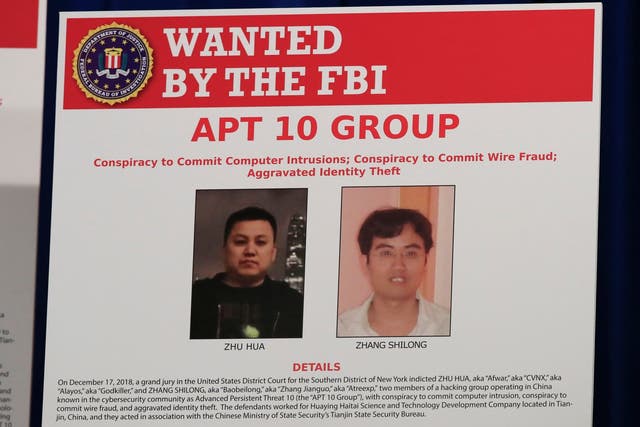 A poster displayed during a news conference at the Department of Justice in Washington