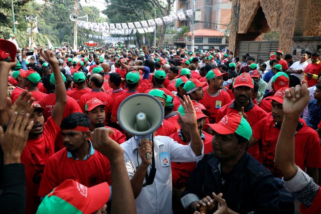 Supporters of the ruling party Bangladesh Awami League campaign in Dhaka on Friday