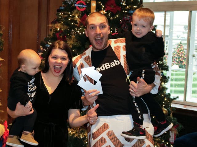 LadBaby aka Mark Hoyle, his wife Roxanne and two sons, celebrating his Christmas Number one with the novelty song, 'We Built This City'.