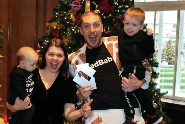 LadBaby aka Mark Hoyle, his wife Roxanne and two sons, celebrating his Christmas Number one with the novelty song, 'We Built This City'.