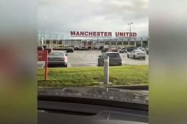Alexis Sanchez makes his way to United's Carrington training ground