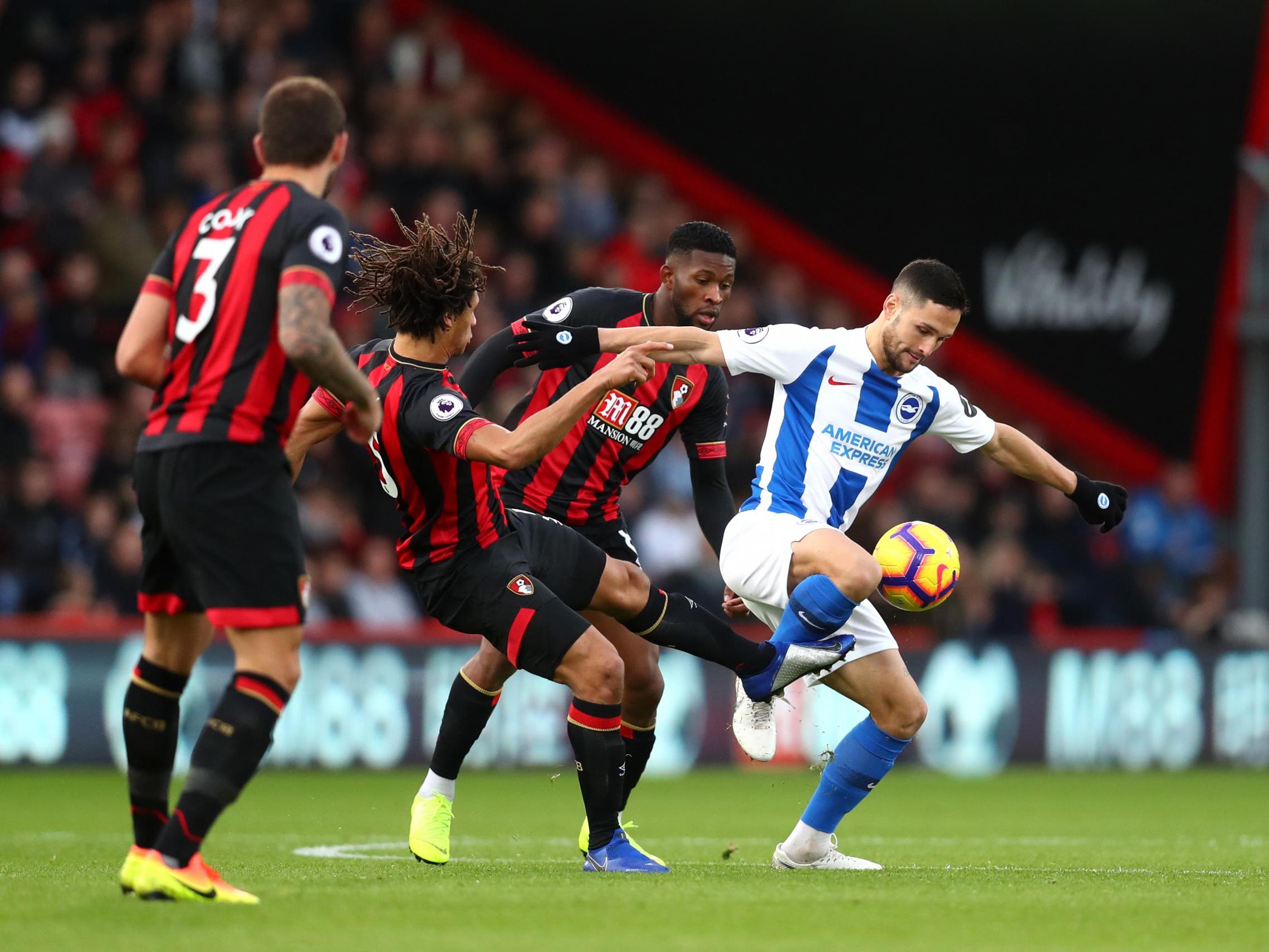 Florin Andone holds off Nathan Ake