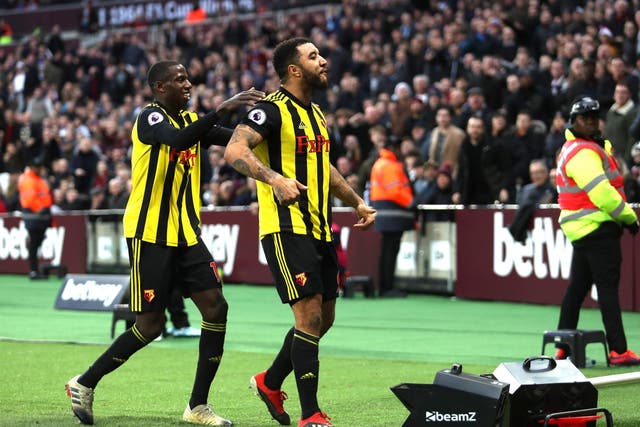 Troy Deeney celebrates after converting from the spot for Watford