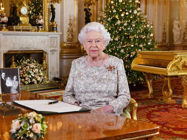 Queen Elizabeth II poses for a photo after she recorded her annual Christmas Day message, in the White Drawing Room at Buckingham Palace in London, United Kingdom