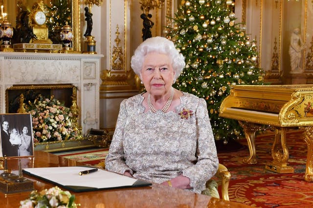 Queen Elizabeth II poses for a photo after she recorded her annual Christmas Day message, in the White Drawing Room at Buckingham Palace in London, United Kingdom