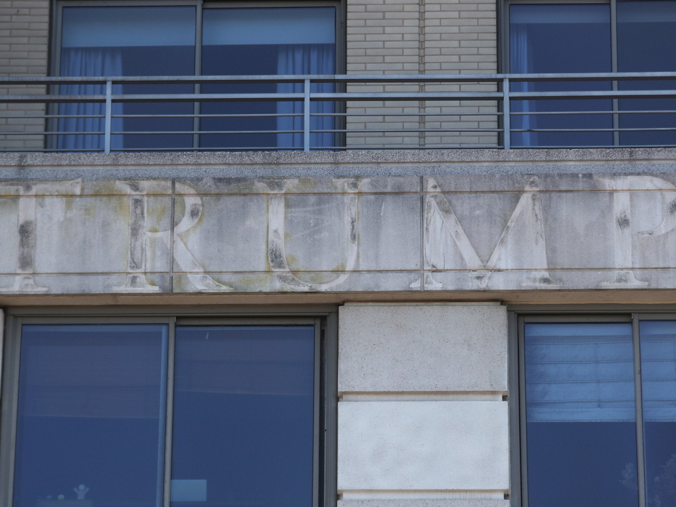 Remains of the name Trump Place after New York tenants voted to strip it