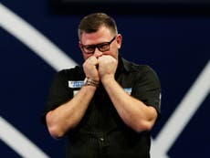 Wade fights back to seal spot in World Championship last 16