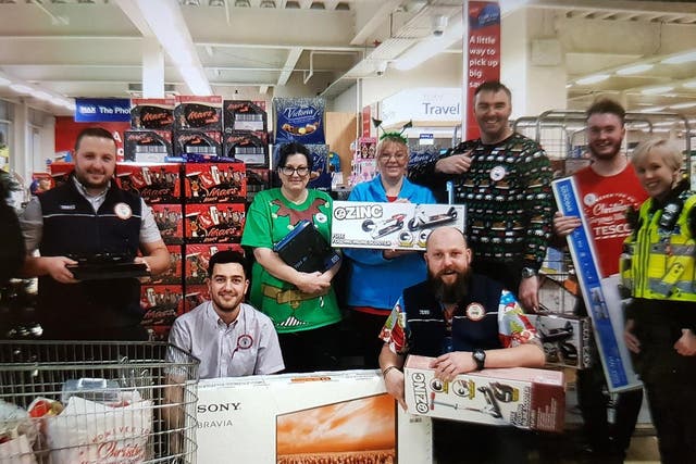 Police officers and Tesco staff bought a family Christmas presents and food after discovering they had little at home